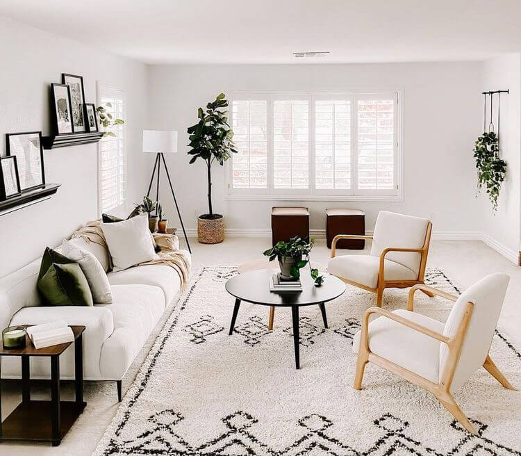 living room with sofa and two accent chairs