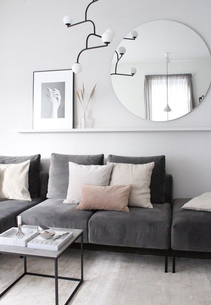 decorating with mirrors over sofa